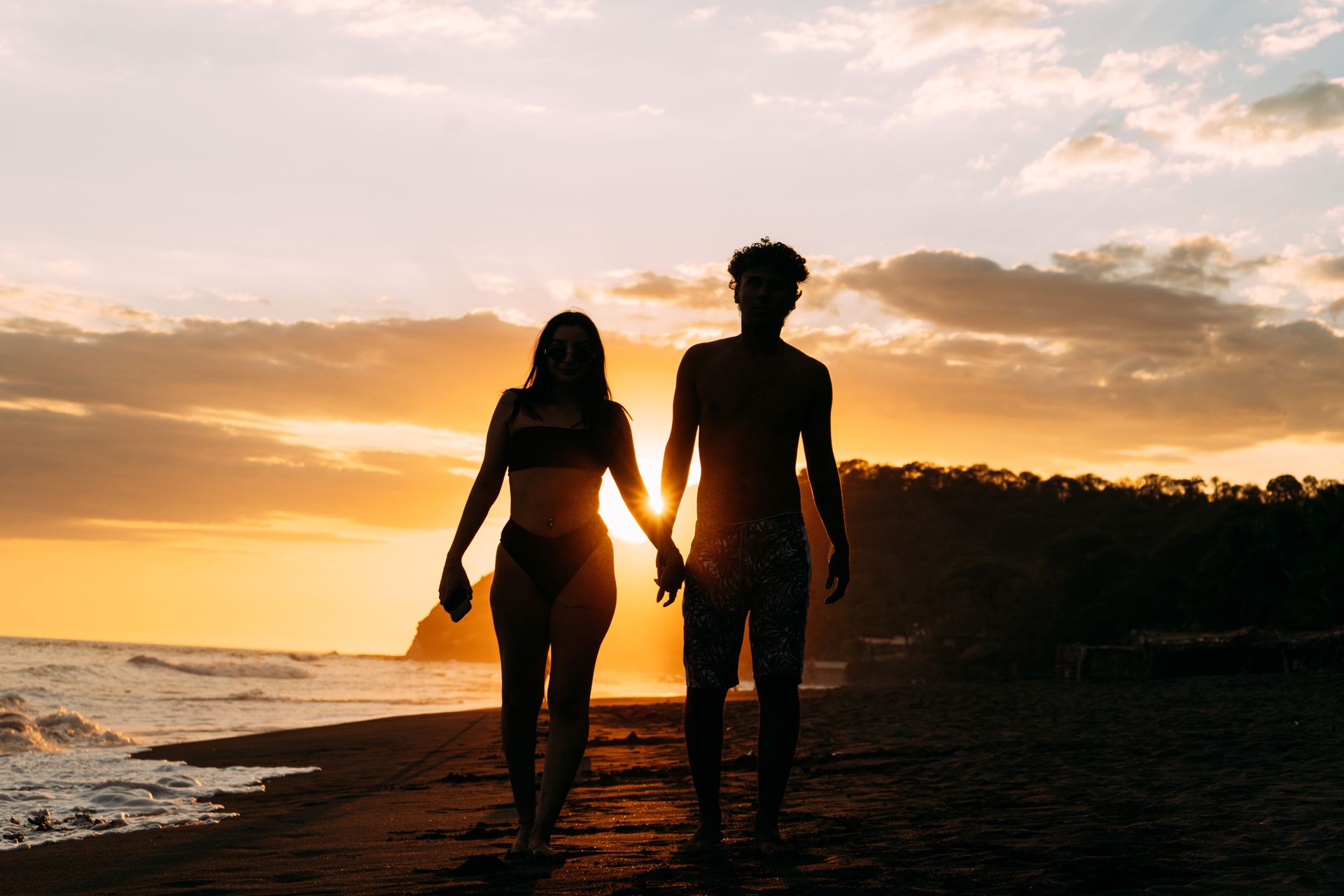 Couple walk beach