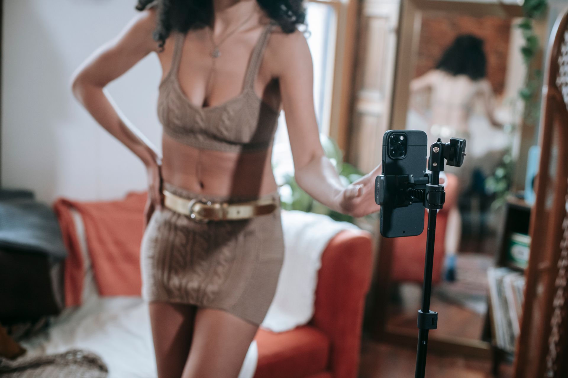 Person phone filming content creator